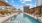 Resort Style Pool with Cabanas and Lounge Seating
